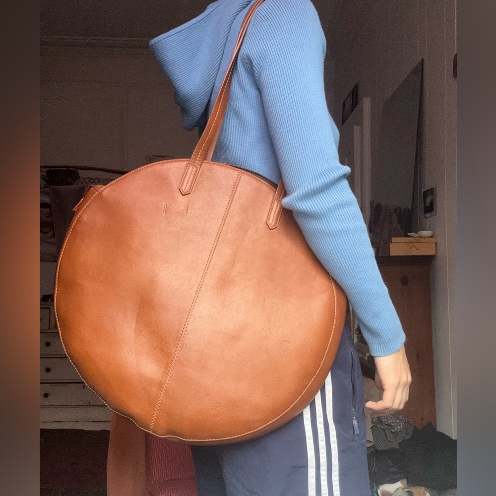 A Universal Thread brown circle bag in faux leather